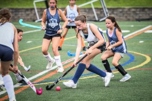 Fairfield – Girls Playing the Ball Field Hockey Camp Girls